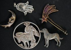 A silver 925 brooch of a Labrador dog together with a Mexican silver man and donkey brooch,