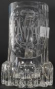 A 19th century German glass tankard of unusual form with chased detailed monogram to centre