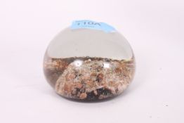 A decorative 20th century glass paperweight of contemporary form.