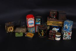 A collection of vintage tins from the 20th century mainly consisting of biscuit tins, sweet tins,