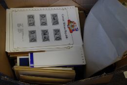 A large box of assorted loose stamps and other philatelic ephemera