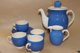 A TG Green ' Polo ' pattern blue and white tea service comprising teapot, cups,