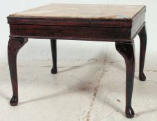 A Queen Anne revival mahogany and marble top side table raised on cabriole legs with pad feet