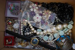 A collection of costume jewellery to include watches, necklaces and brooches etc.