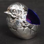 A Victorian style silver plated pin cushion in the form of a baby chick. Weight: 58g.