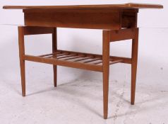 An unusual 1960's Formwood Furniture Co Special Needs adapted faux wood formica coffee table having