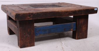 A good upcycled late 20th century heavy oak coffee table constructed from railway sleepers having a