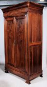 A 19th century French walnut armoire double wardrobe.