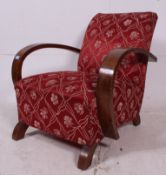 A stunning 1930's Art Deco French bentwood upholstered armchair.
