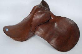 A vintage 20th century leather horse saddle ( unnamed,