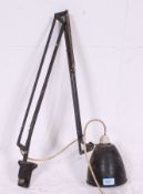 A vintage Industrial machines Herbert Terry anglepoise lamp.