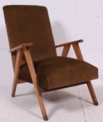 A retro Danish 1960's armchair raised on stunning angular frame with the original upholstered seat