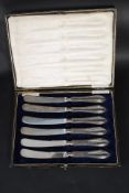 A cased set of 6 silver hallmarked knives bearing Sheffield hallmarks for Frank Cobb & Co Ltd,