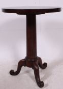 A Victorian mahogany tripod - side hall lamp table having circular top with tripod base with turned