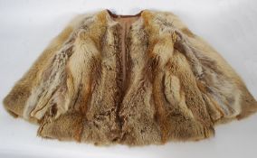 A vintage ladies 1950's fur  short coat having lined interior with original CC41 utility label