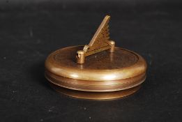 A vintage style brass pocket compass.