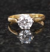 A 14ct gold yellow metal dress ring, with large central stone. 2.