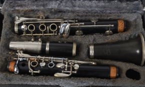 A 20th century cased clarinet by Rene Duval being marked to the stem.