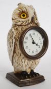 An early 20th century continental bronze painted owl clock,