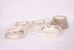 A Royal Couldron ' Royal Leaf ' dinner service to include plates service dishes etc