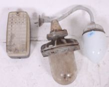 A good vintage 20th century Industrial bulkhead dairy light on shaped arm ( see illustration ) Q.