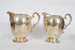 A pair of large Victorian early 20th century silver plated jugs. Weight: 2250g GW.