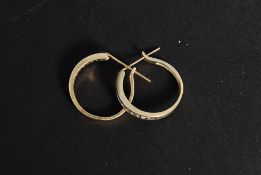 A set of 9ct gold and diamond hoop earrings. 2.