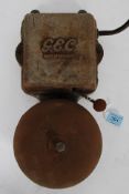 A vintage mid 20th century GEC alarm bell having circular bell and striker