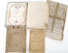A collection of French military items to include a soldiers notebook with hand drawn emblems,