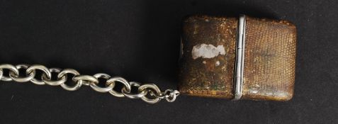 A 1930's Art Deco Sportank silver and snakeskin purse watch complete with white metal albert fob