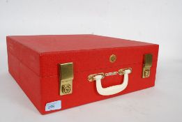 A vintage 1960's Brexton picnic set in it's original red carry case with contents