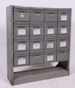 A mid 20th century metal office Industrial filing cabinet in grey metal.