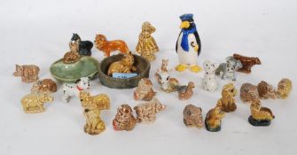 A collection of Wade wimsies to include a rare Penguin pepper cruet