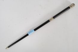 A fabulous Victorian silver (although unmarked) and ebonised conductors baton,