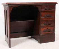 A good late Victorian mahogany clerks desk of small proportions having a bank of drawers flanking