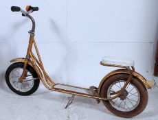 A retro 1970's Scooter in original gold paint with unusual seat to rear.