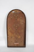 A vintage early 20th century wooden bagatelle board game entitled Corinthian