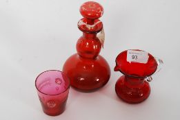 A 19th century red / cranberry glass decanter complete with the stopper together with a cranberry