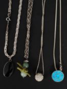 A collection of silver 925 necklaces to include a turquoise set roundel pendant and chain,