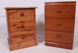 2 20th century pine bedside cabinets, each with a series of drawers having knob handles.