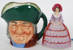 A rare Carltonware crinoline lady miniature bell being marked to the base together with a Royal