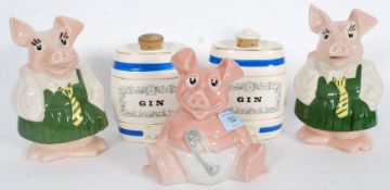 3 Natwest pigs by Wade together with  2 Wade barrels with blue banding and central notation