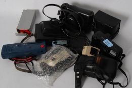 A collection of vintage cameras to include canon,