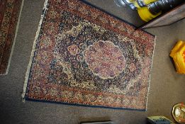A vintage style Belgian Kelim rug with blue ground together with another larger Turkish style rug