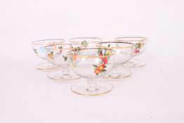 A collection of 6x retro glasses - each decorated with fruit to the rims