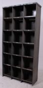 An vintage Industrial metal 18 hole pigeon hole / parts bins shelving system.