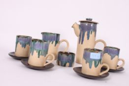 A 1970's Eric Leaper studio pottery coffee service comprising coffee pot, cups, saucers etc.