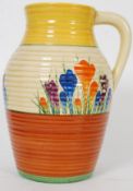 Crocus - A Clarice Cliff single handled Lotus jug circa 1931 hand painted with a deep band of