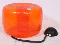 An original 1960's inflatable orange stool, purchased by the vendor in 1969 from the Champs Elysee.