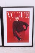 A pair of framed and glazed magazine covers of Vogue magazine